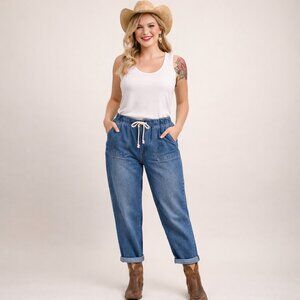 NWT - Size 9 "Super High Rise Jogger" faded blue denim jeans. Blue pants.